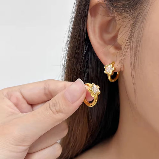 Star white crystal bezel huggie earrings