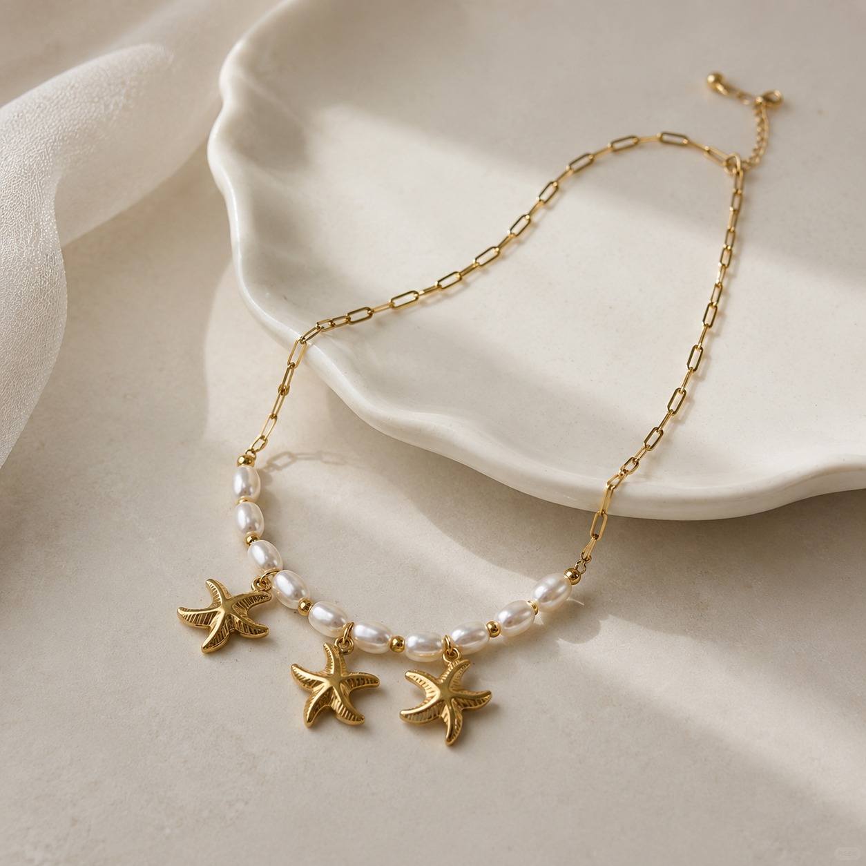 Star with pearl necklace