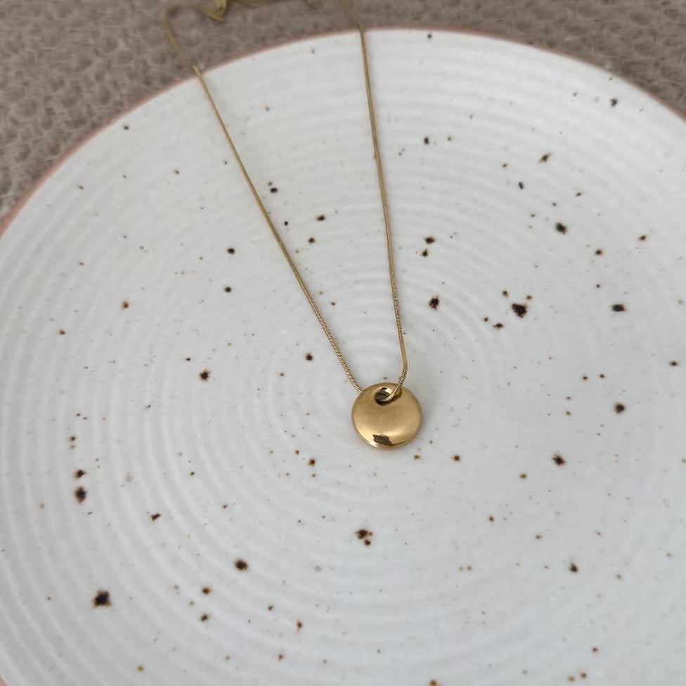 Bare gold coin necklace