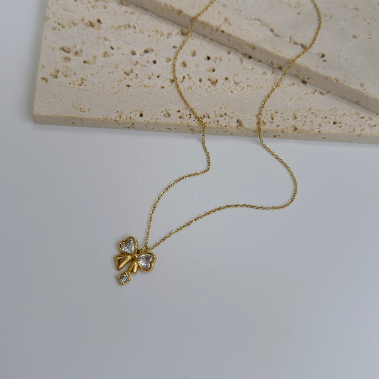 Crystal heart bow necklace