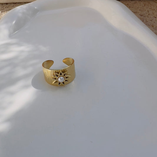 Sun with pearl ring