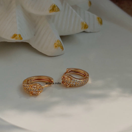 Small white snake earrings