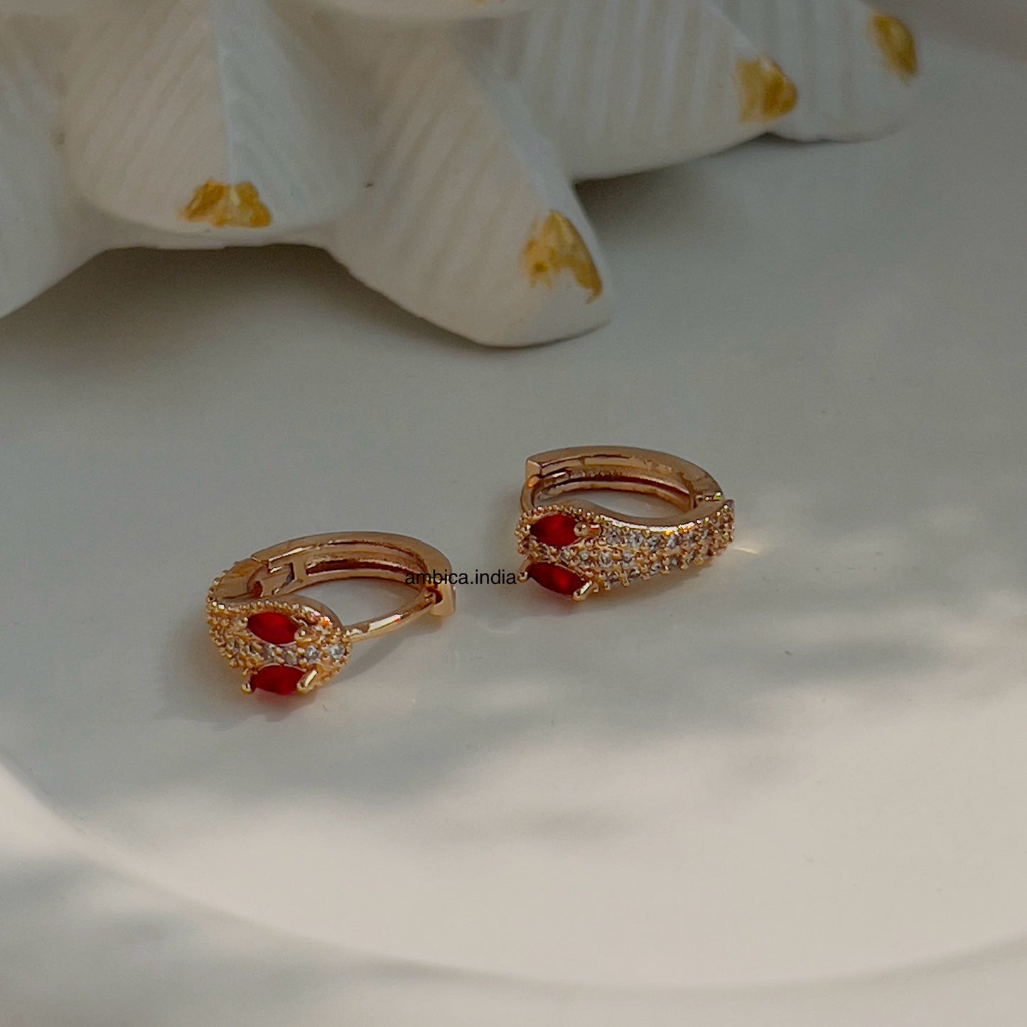 Small red snake earrings