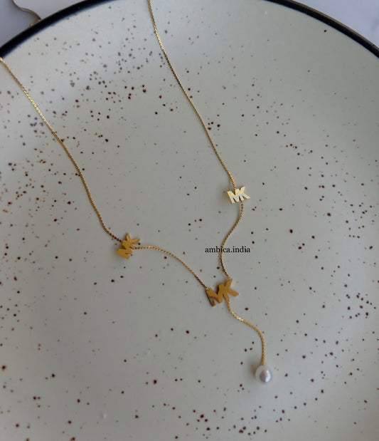 Pearl with mk necklace