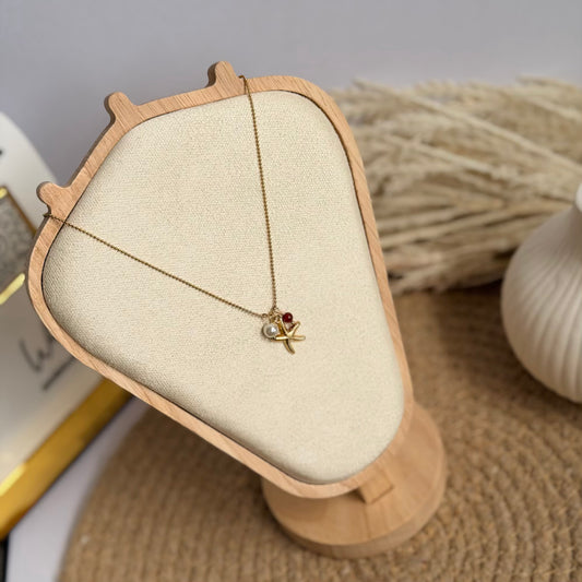 Starfish with pearl necklace