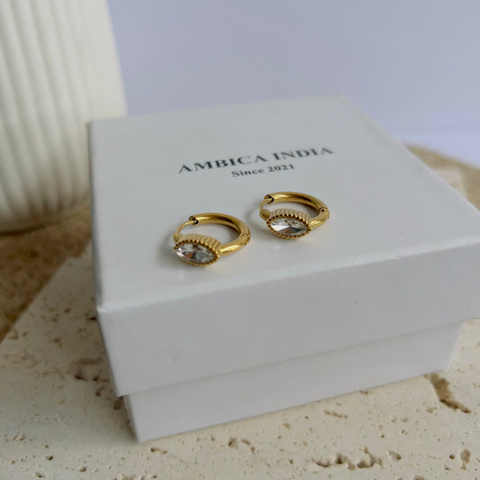 White crystal bezel huggie earrings