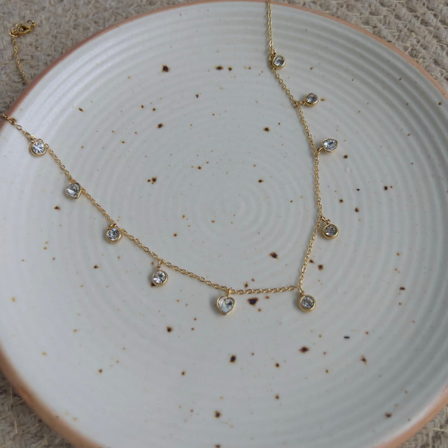 Round with heart white crystal necklace