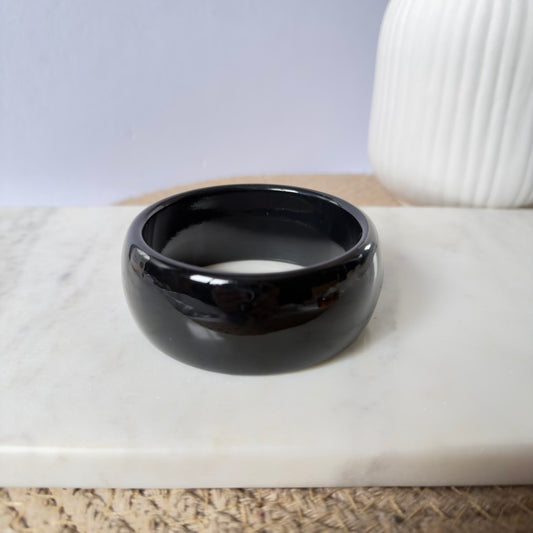 Bold black bangle