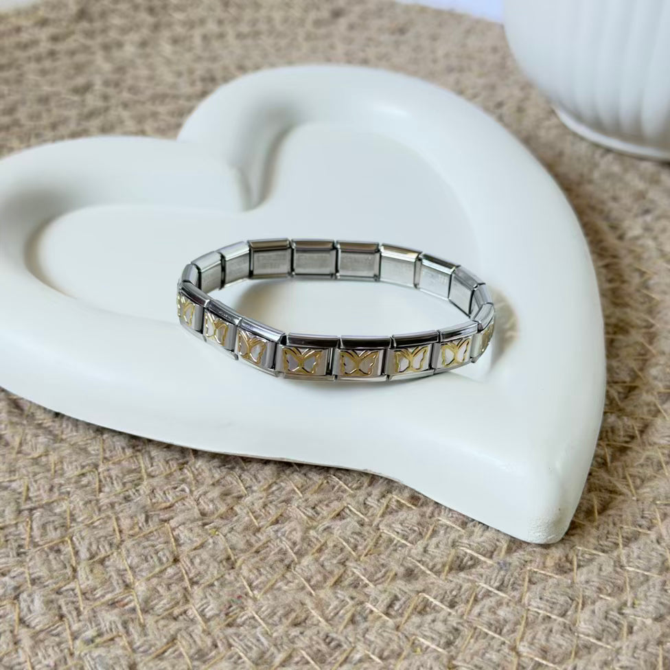 Butterfly two tone charm bracelet