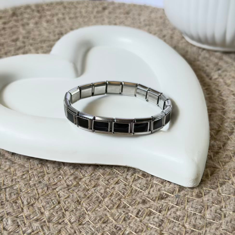 Black charm bracelet