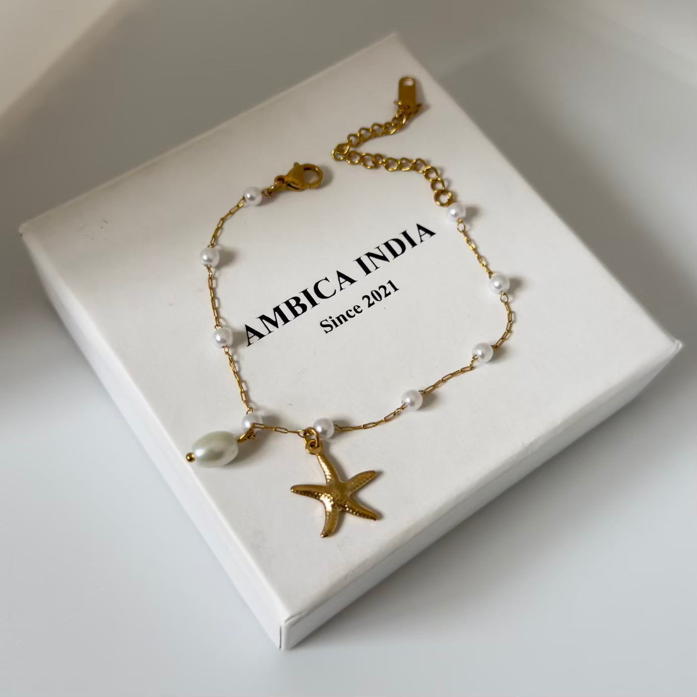 Pearl with starfish charm bracelet