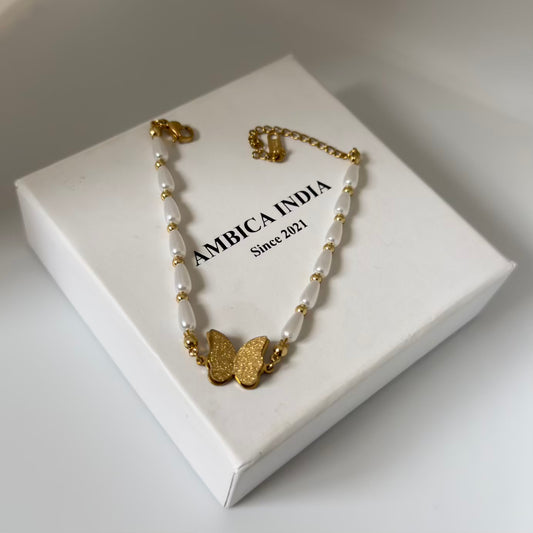 Butterfly with pearl bracelet