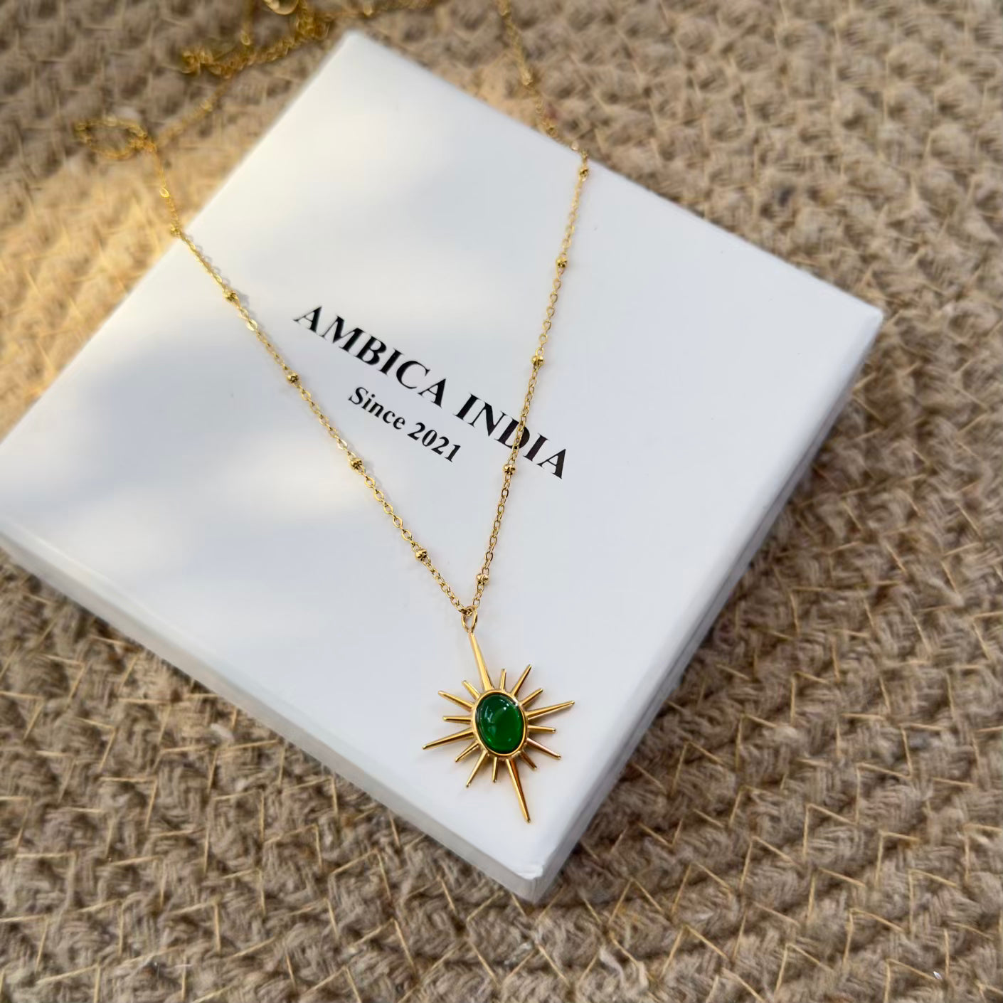 Emerald sun necklace
