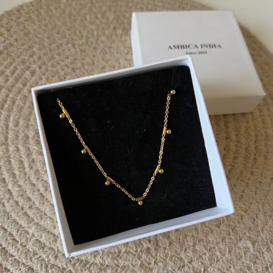 Tiny charm drops necklace