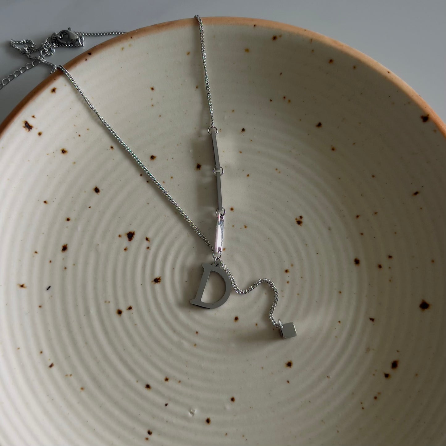 D hanging necklace