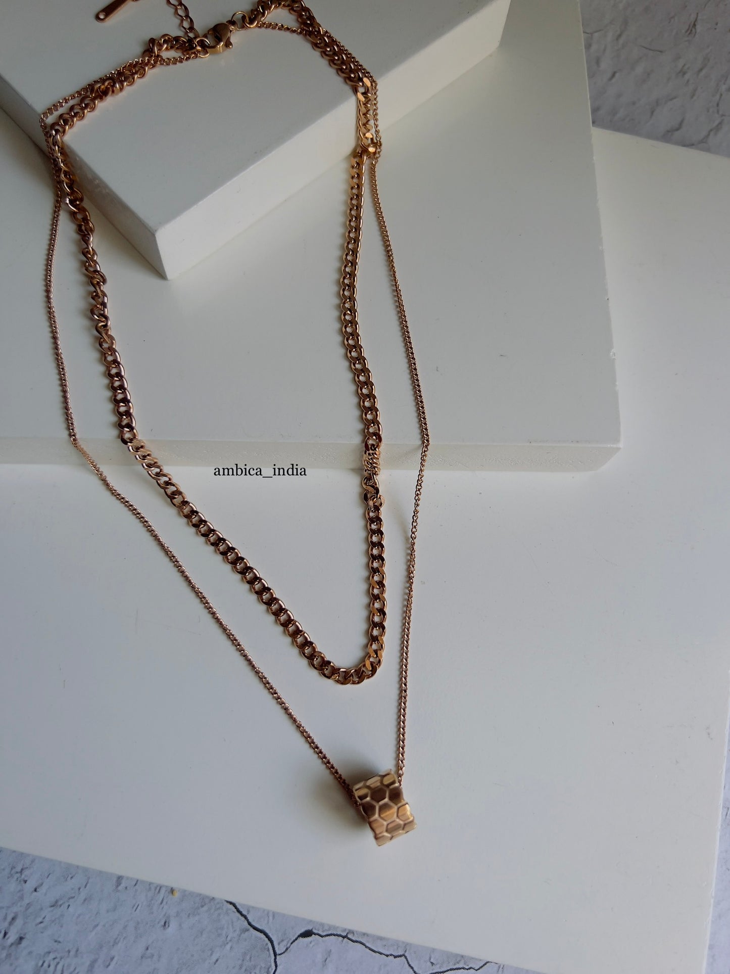 Round pendant with layered necklace