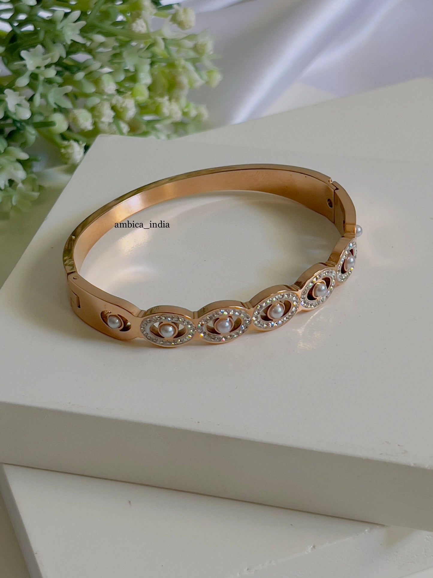 Pearl with studded bracelet