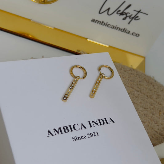 Tiny white round crystal earrings