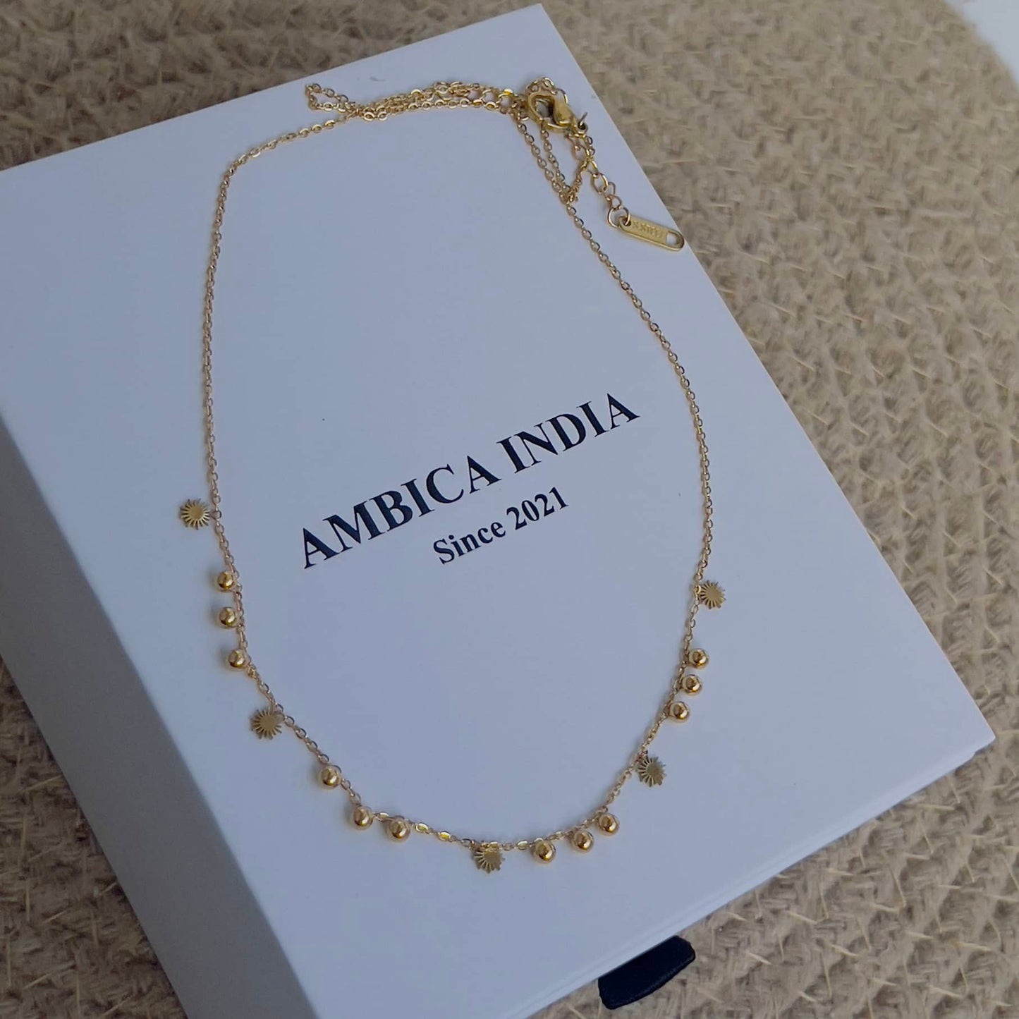 Tiny ball with sun necklace