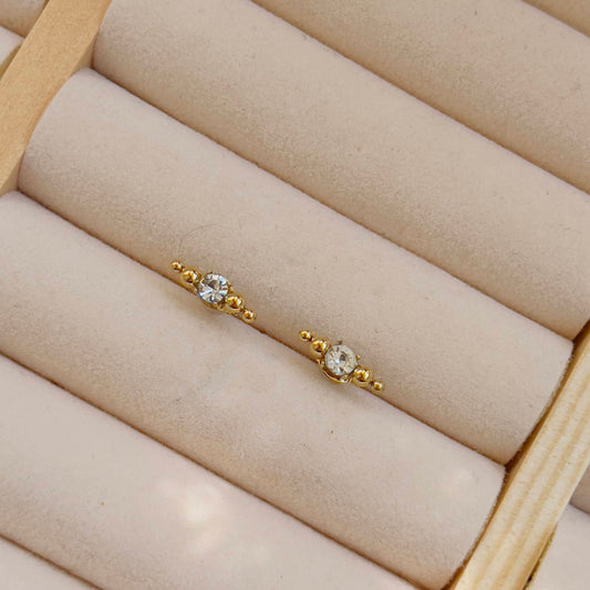 Tiny white crystal studs
