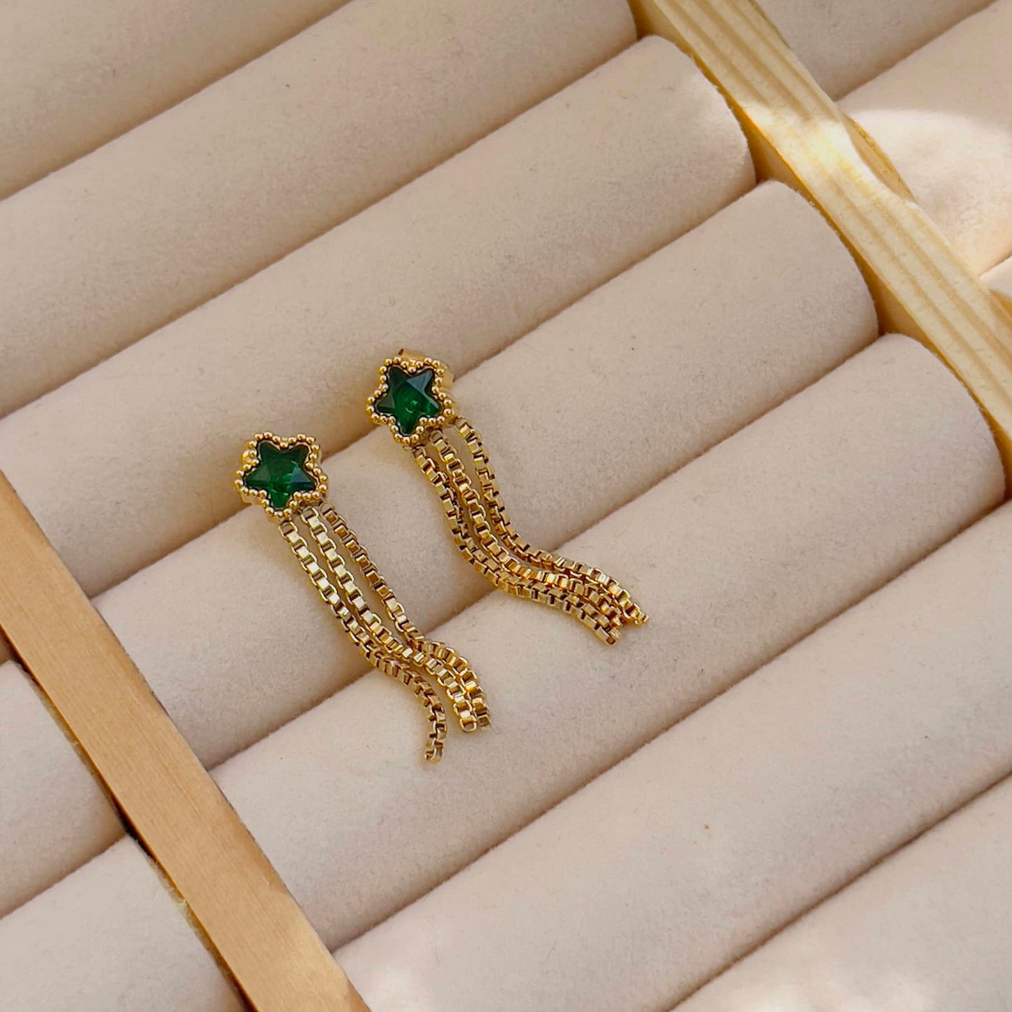 Green crystal star earrings