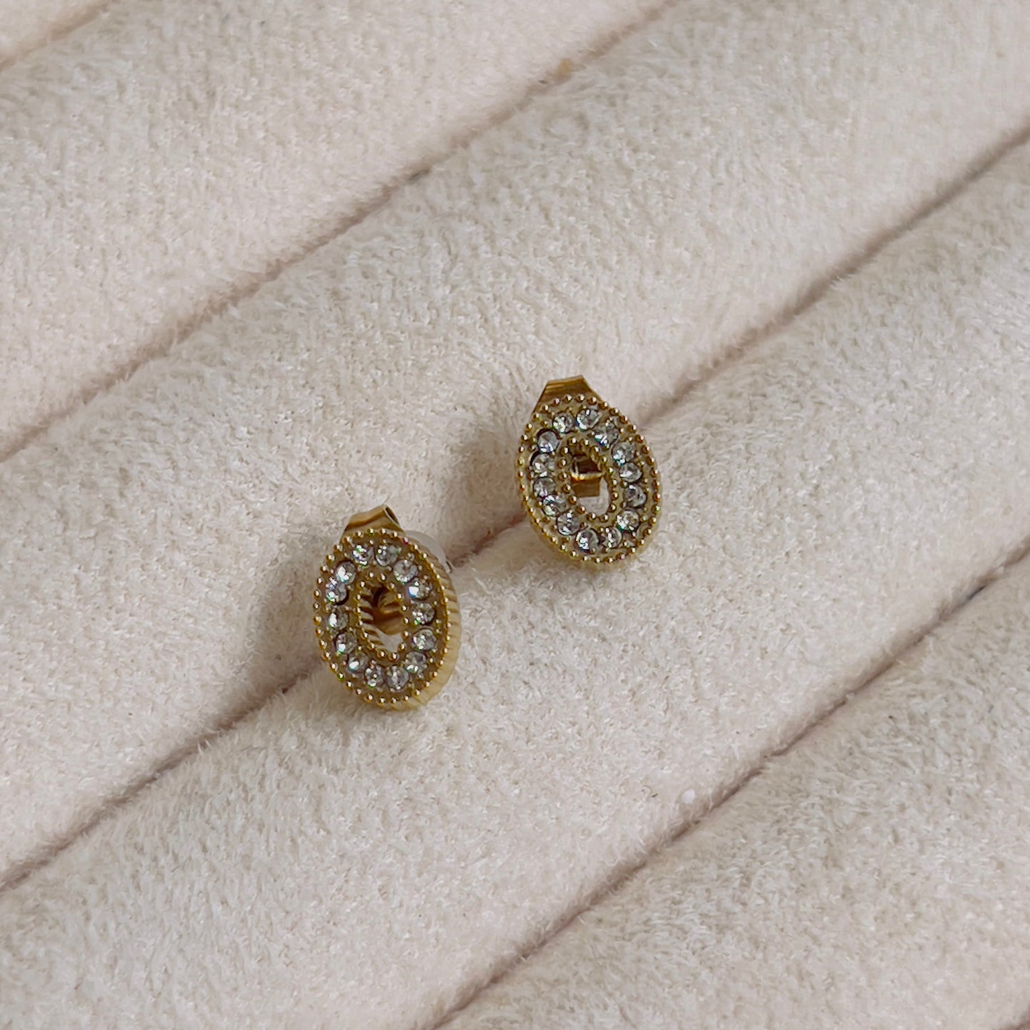 Oval white crystal earrings