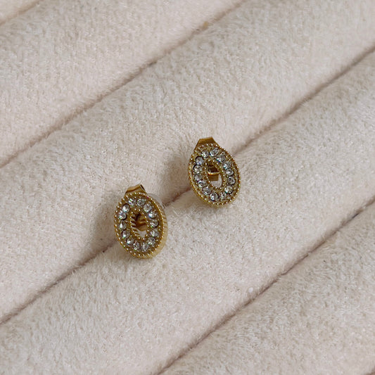 Oval white crystal earrings